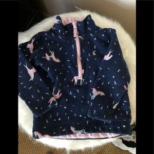 Adorable half-zip sweatshirt with unicorn print